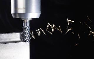 Close-up of a CNC cutting tool throwing metal shavings