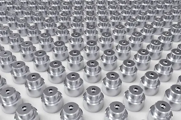 Rows of finished CNC-machined metal parts