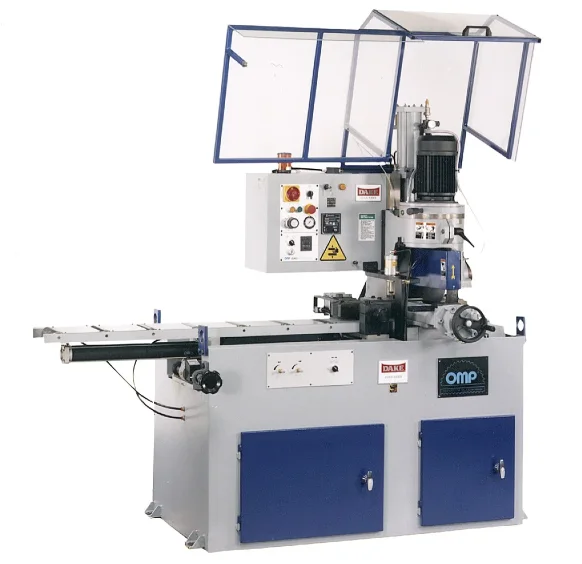 A Dake automatic cold saw with a blue and gray cabinet, control panel and a clear safety guard raised above the blade